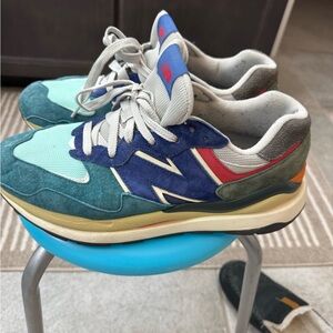 New Balance Sneakers with White and Blue Accents